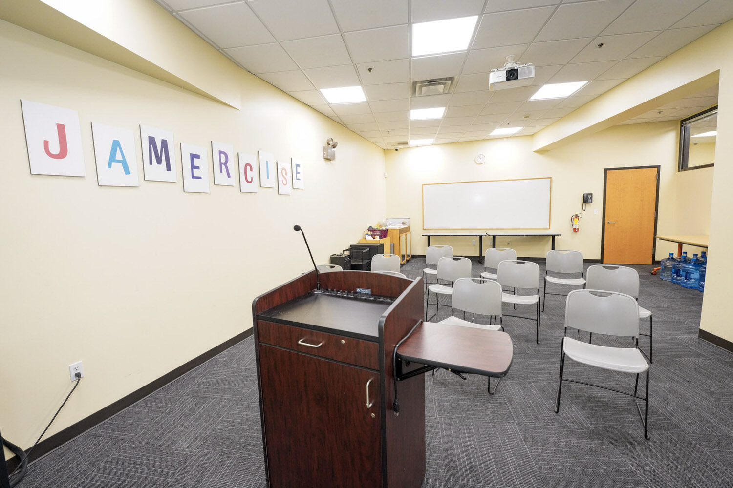 Cherry Hill meeting room showing a speaker's view from the podium with microphone