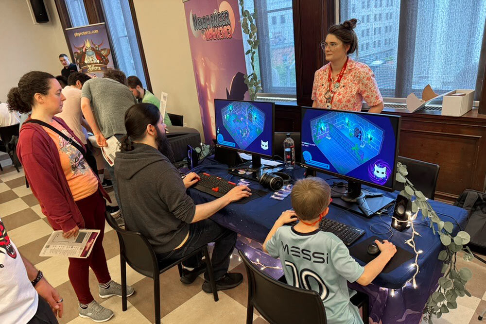 Indie Video Game Fest 2025 - library staff welcoming people gaming